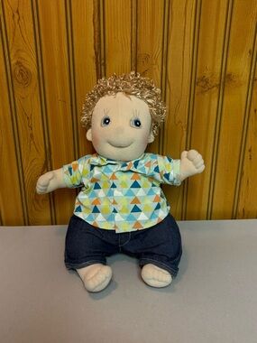 Cuddly Plush Baby Doll in Multicolor Triangle Shirt and Dark Blue Pants